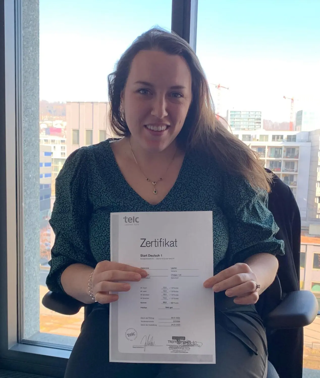 Woman holding certificate